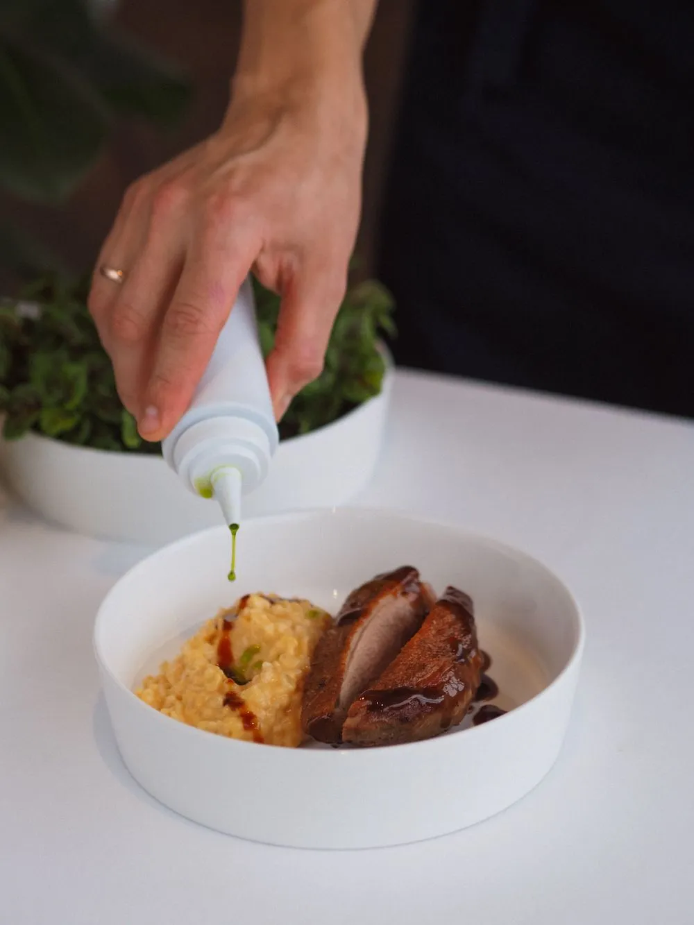 Artistic plating of contemporary New Zealand cuisine